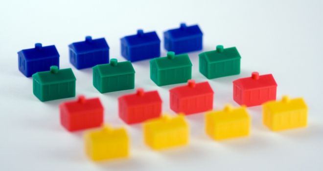 rows of plastic monopoly houses