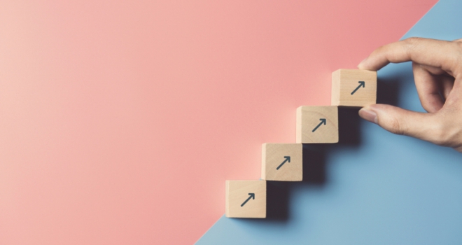 wooden blocks with arrows, pointing upwards